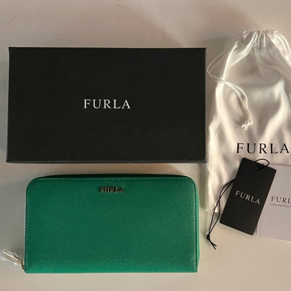 Furla extra large zip around leather wallet. Brand new with tags in box